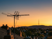 How to Locate Broadcast Towers Near You: 7 Free Tools That Work How to locate broadcast towers: a rooftop aerial aimed at a distant transmission tower