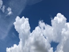 Why Is the Sky Blue? 3 Simple Physics Facts That Explain It Blue sky with clouds illustrating Rayleigh scattering