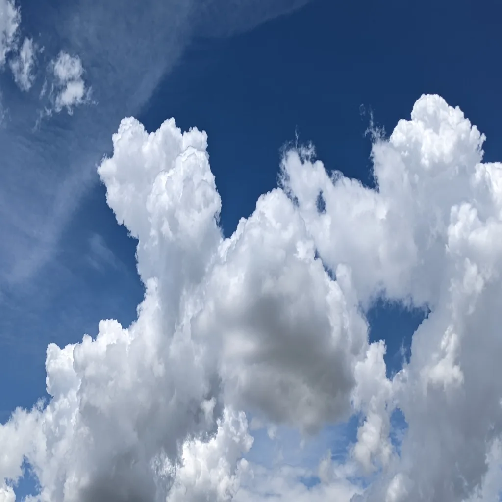 Blue sky with clouds illustrating why is the sky blue