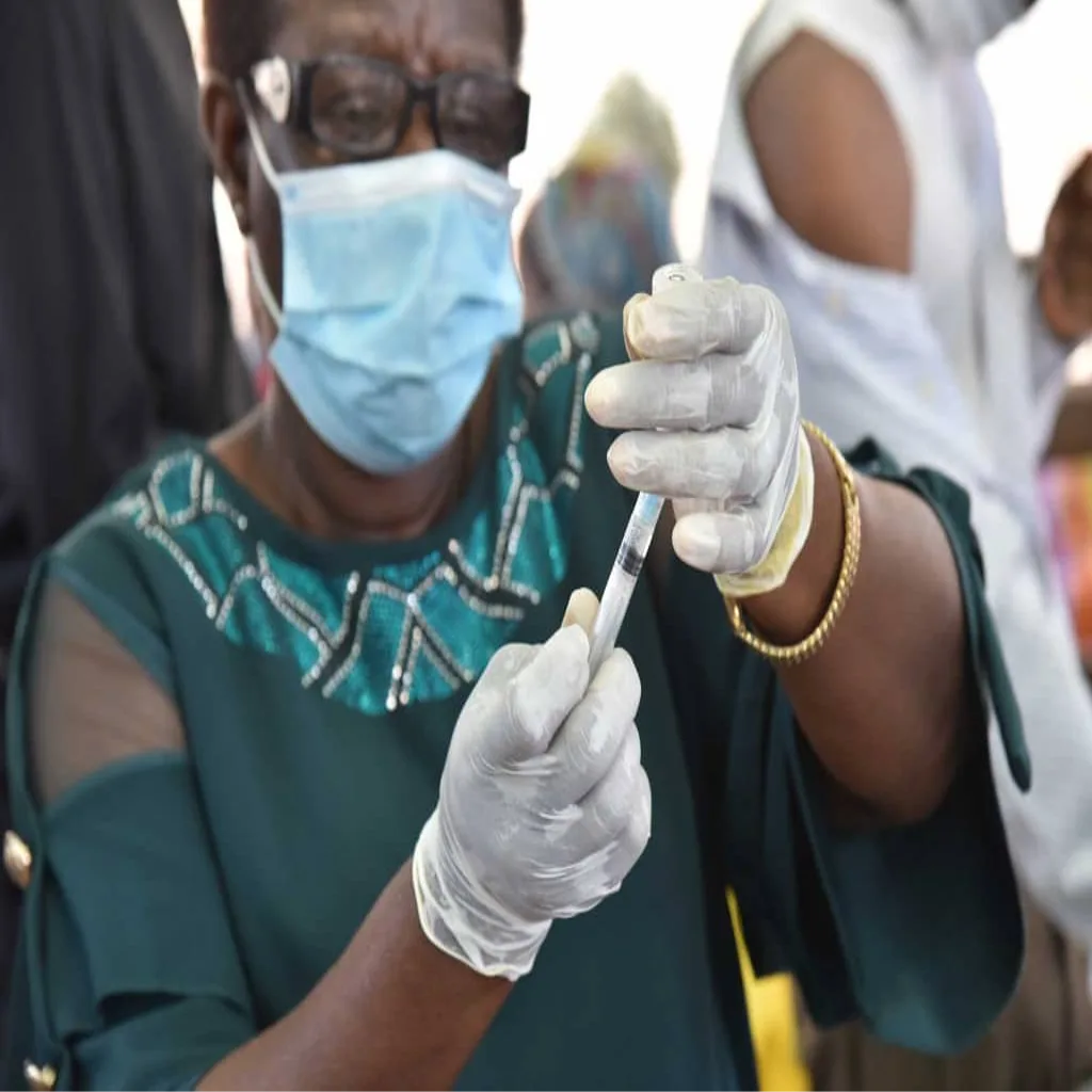 Vaccination injection in progress
