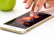 IRS Mobile App: What Replaced IRS2Go and How to Avoid Fakes Hand holding a smartphone