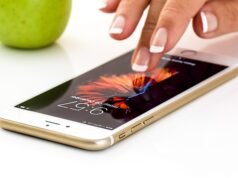 IRS Mobile App: What Replaced IRS2Go and How to Avoid Fakes Hand holding a smartphone
