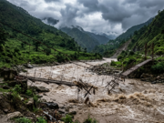 Budhi Gandaki Flood in Gorkha: What We Know (October 2026) AI-generated illustration of a swollen river in a Nepal valley, with a damaged suspension footbridge in floodwater